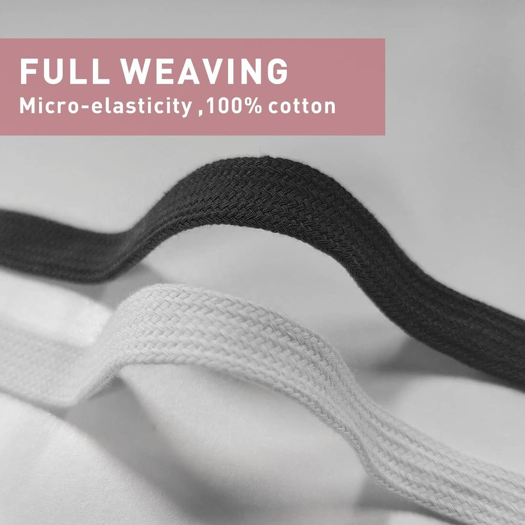 Close-up of black and white woven cotton shoelaces side-by-side