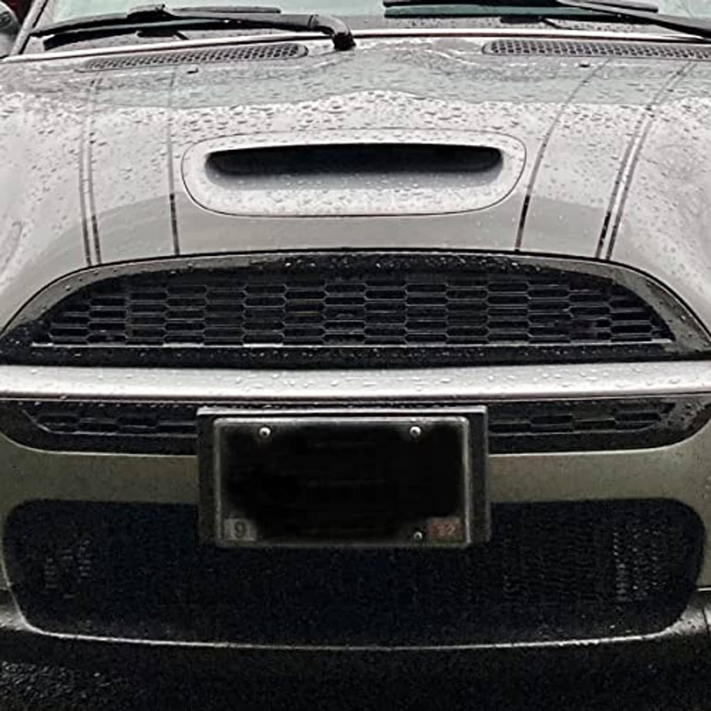 Installed black honeycomb front grille with upper and lower mesh sections