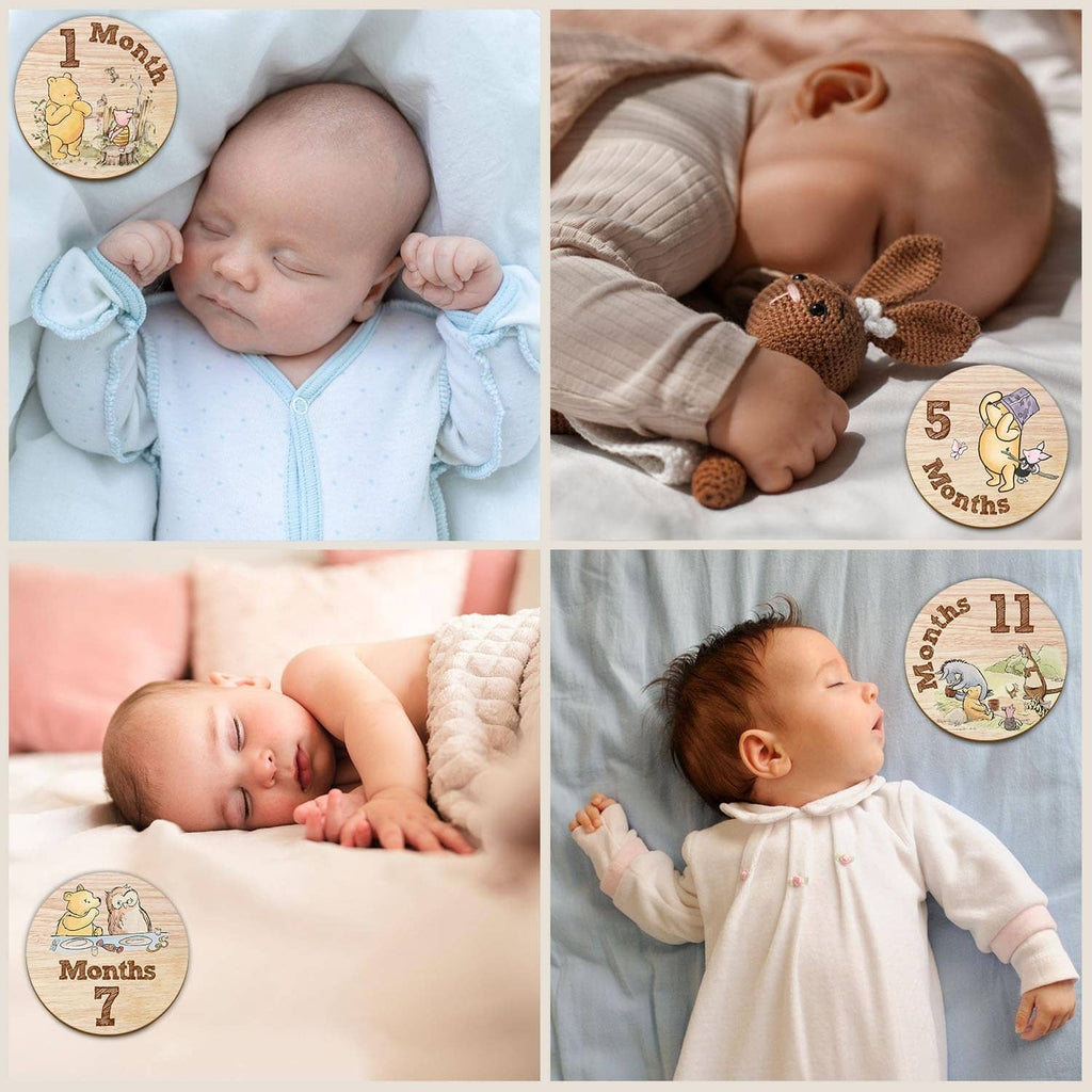 Newborn swaddled for a photo, with a round wooden milestone sign showing 7 months.