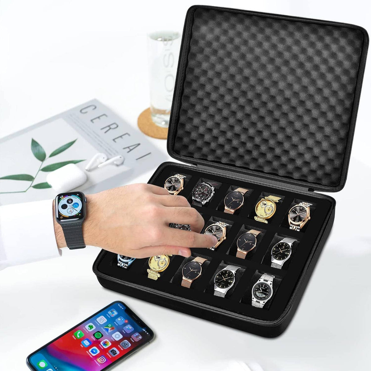 Black 15-slot watch storage case open with multiple watches in grid compartments