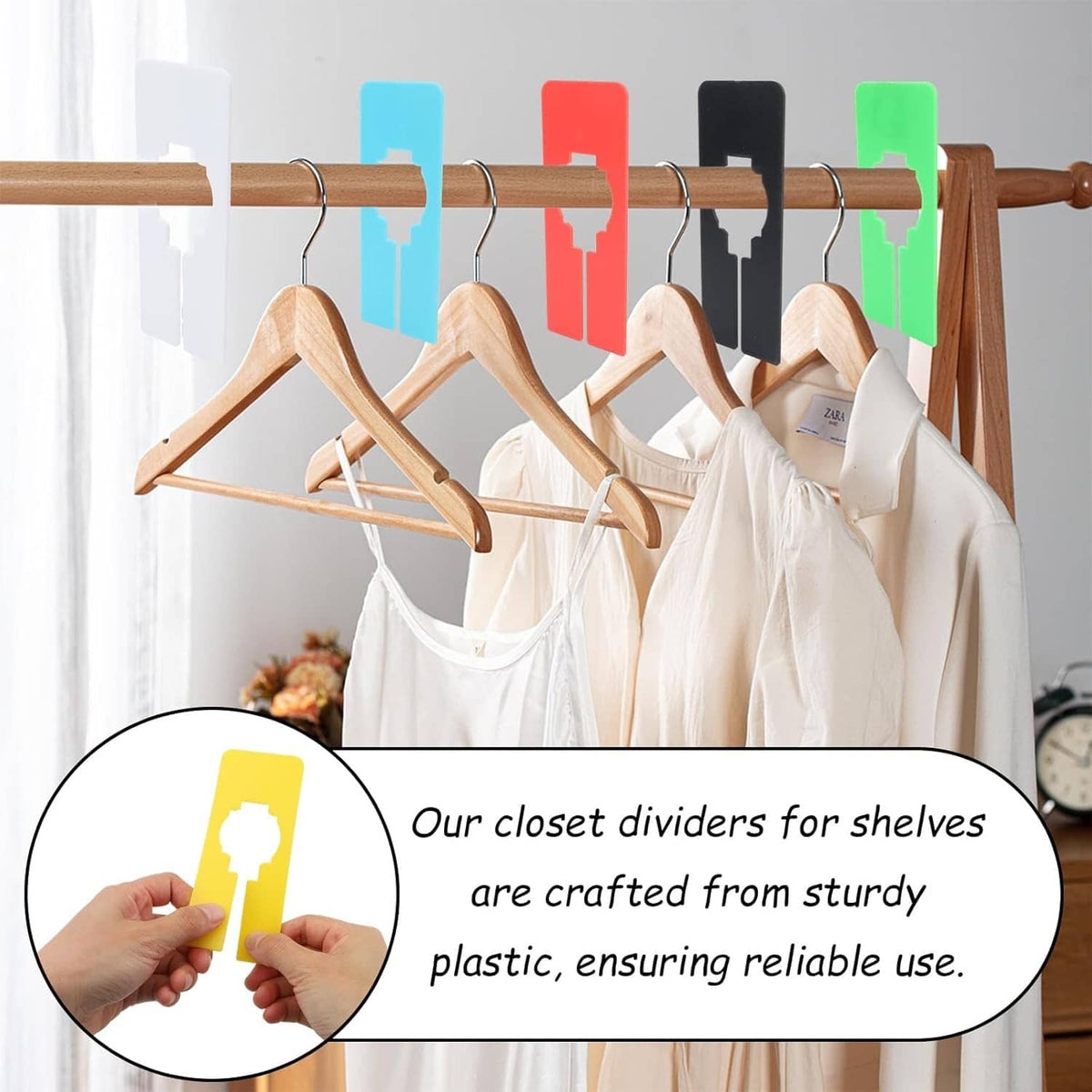 Plastic closet rack divider clips separating clothing on a hanging rod, with multicolor pieces