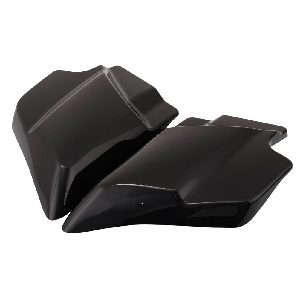 Black motorcycle side cover panels set, close side angle showing glossy top contours