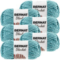 Light teal textured yarn skeins in 6-pack with Bernat Blanket labels
