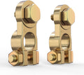 Brass battery terminal connectors with threaded bolts, one marked + and one marked -