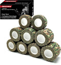 Multiple camouflage elastic cohesive tape rolls with white center cores, self-adhesive material.