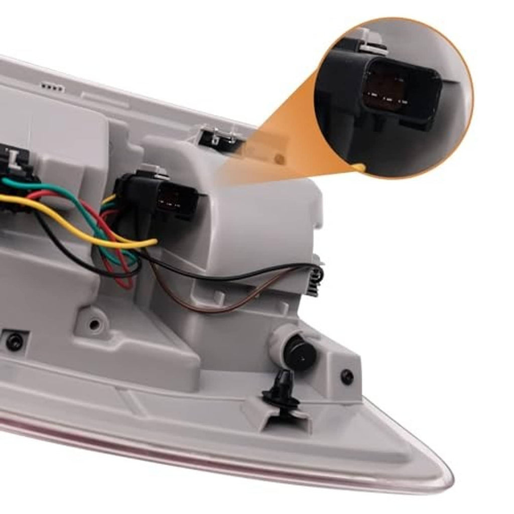 Tail light circuit wiring inside housing, showing connectors and mounting points.