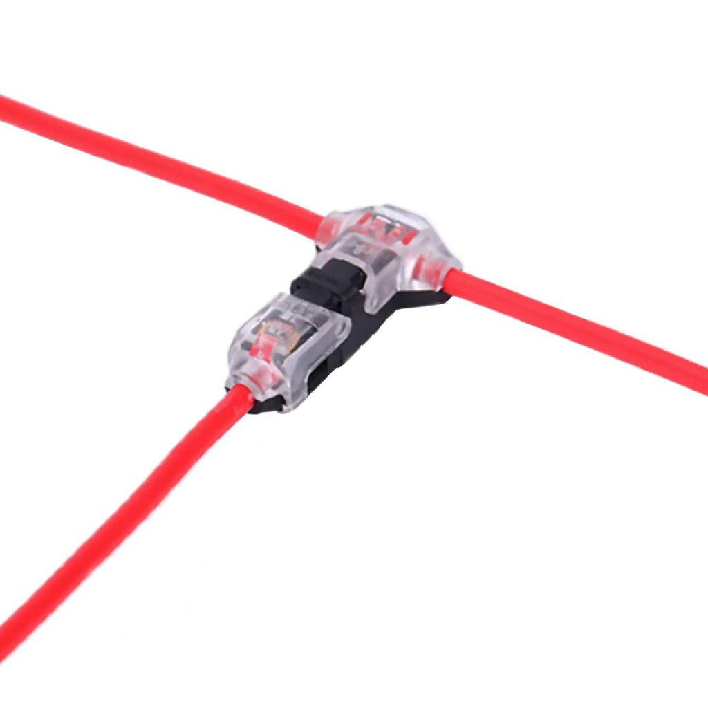Low-voltage wire splice connector with clear housing and black clip, joining red wires