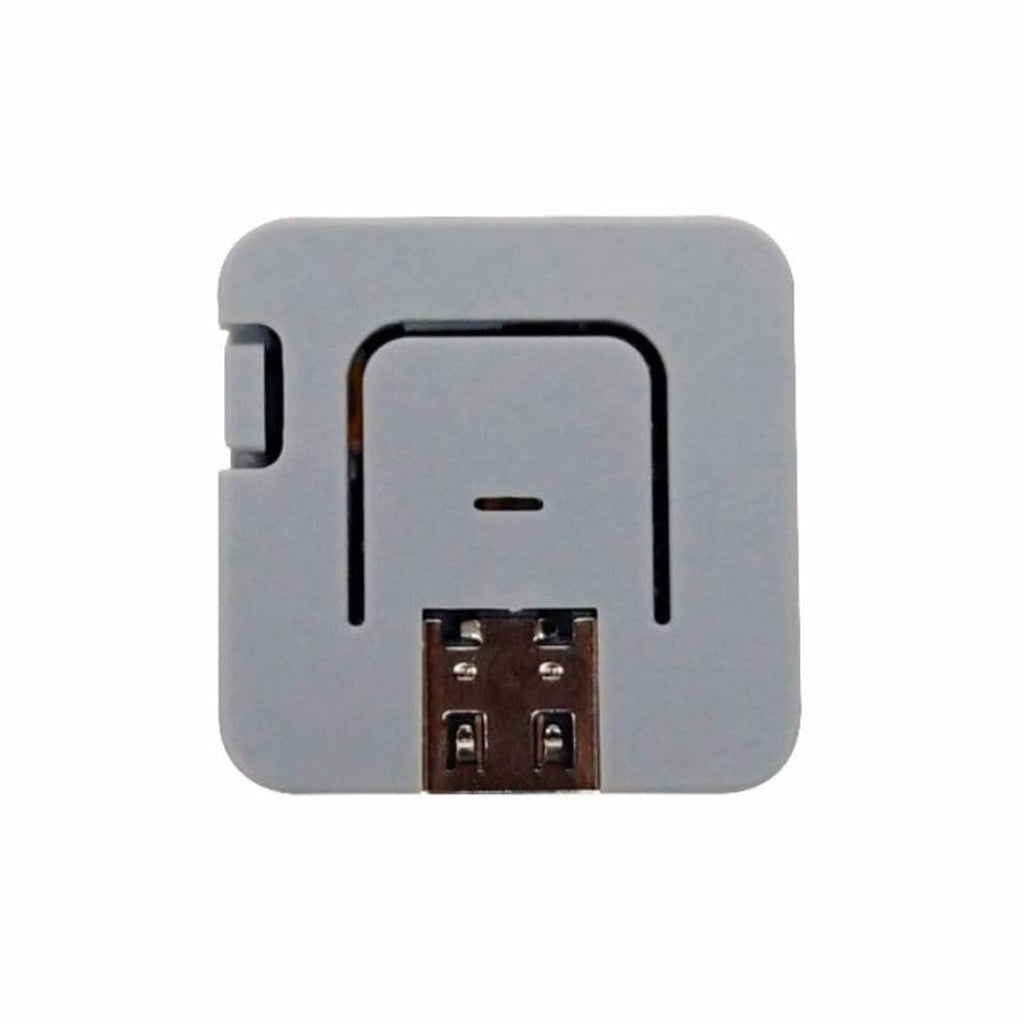 Grey ATOM Lite ESP32 module front face with two-pin connector and window