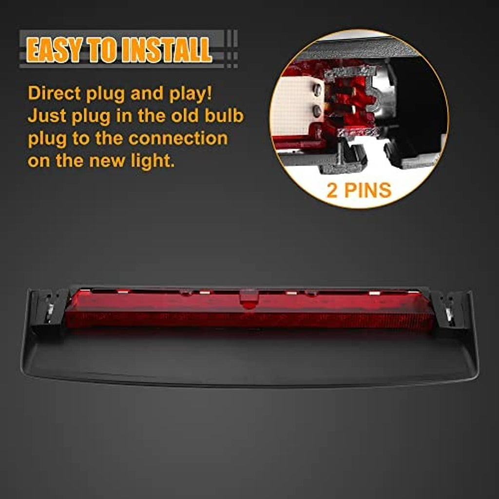 Third brake light with red lens and two-pin connector inside dark cover