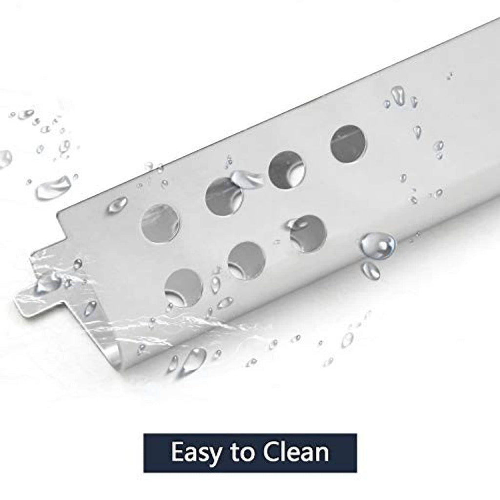Stainless steel gas grill burner tube surface with drainage holes, designed for easy cleaning