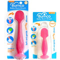 Pink baby bum brush with suction base and soft flexible silicone head