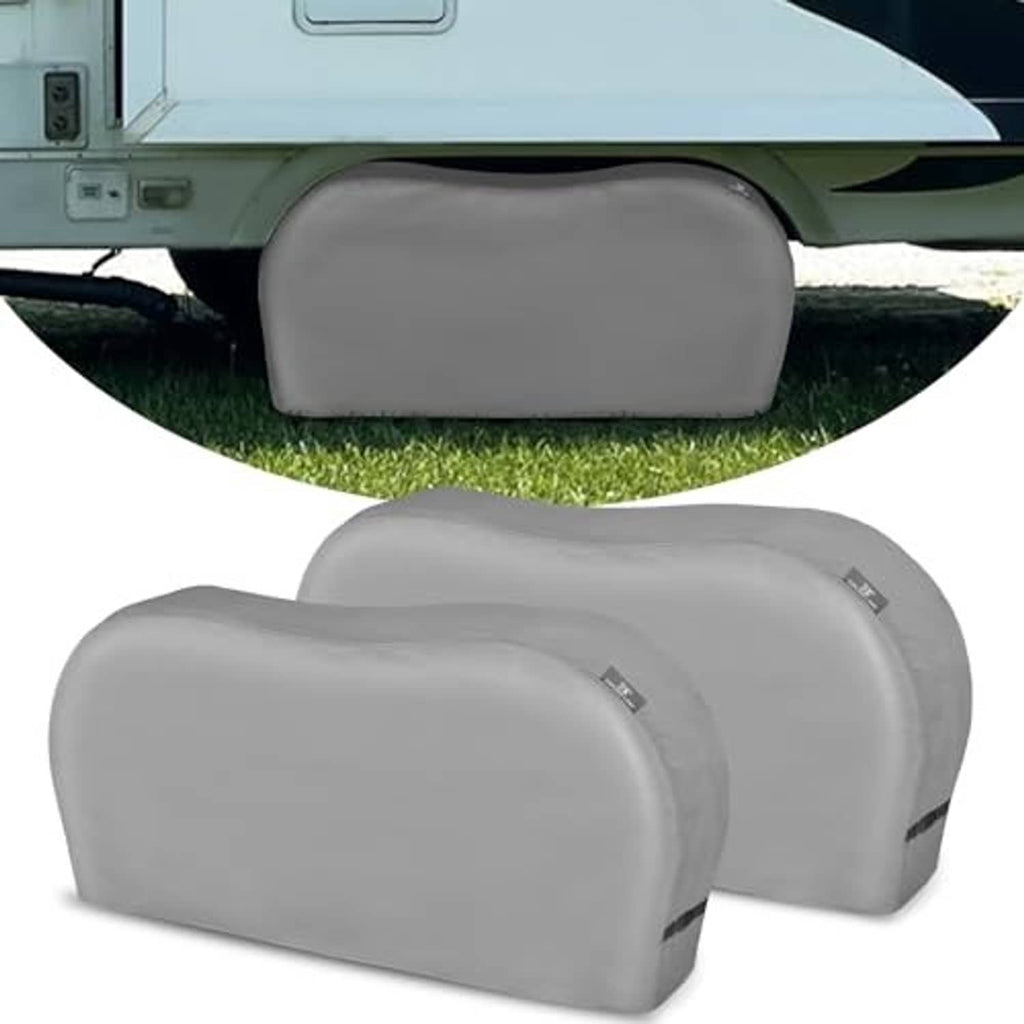 Gray dual tire cover with arched profile and small logo label patch on front