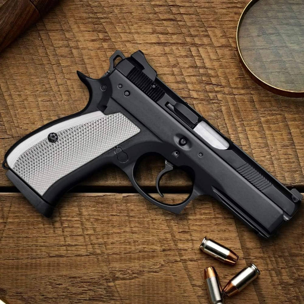 Aluminum pistol grip panels installed on a black handgun frame, silver textured overlay