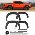 Black front and rear fender flare set with mounting hardware and brackets