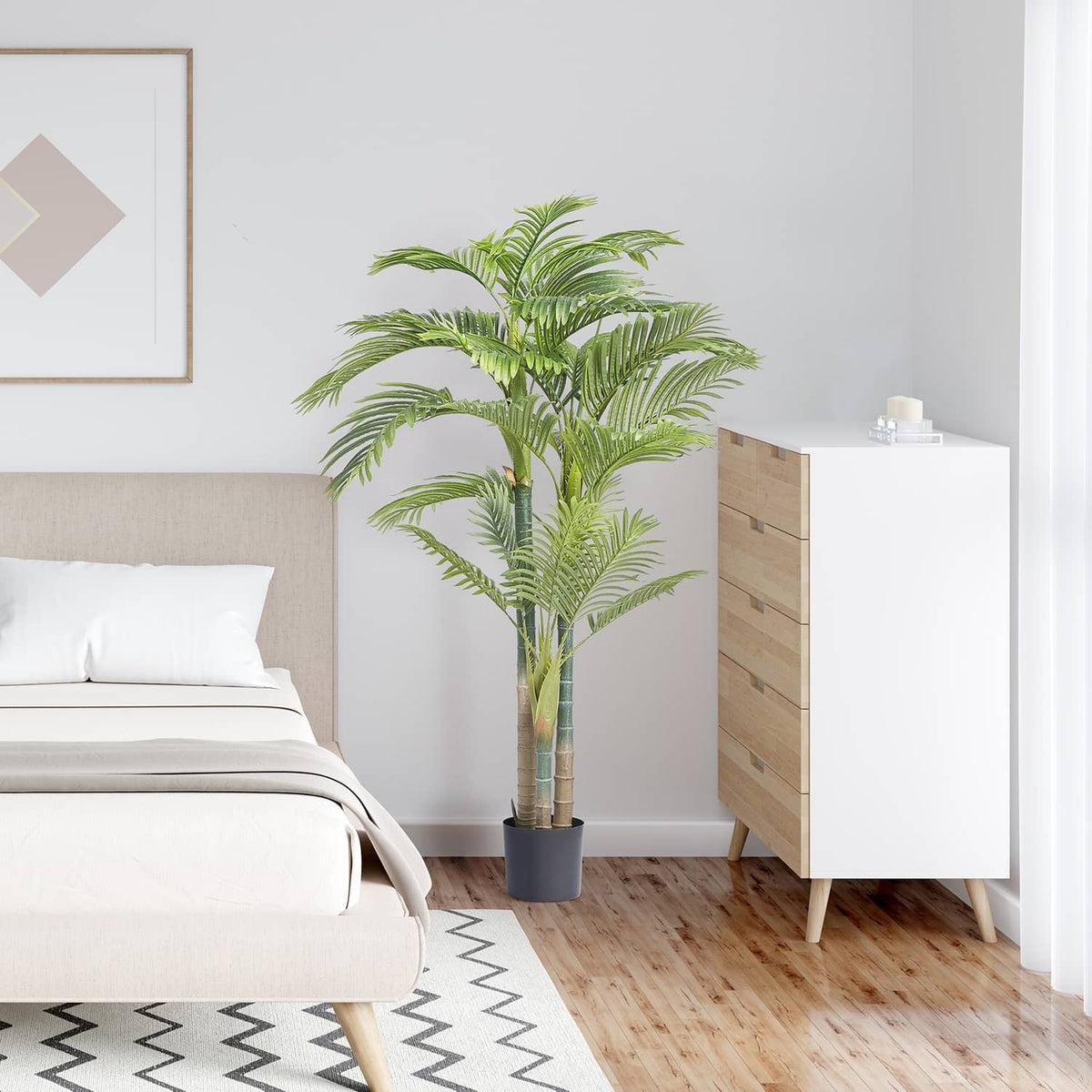 Artificial golden cane palm tree with green fronds in black pot for indoor decor