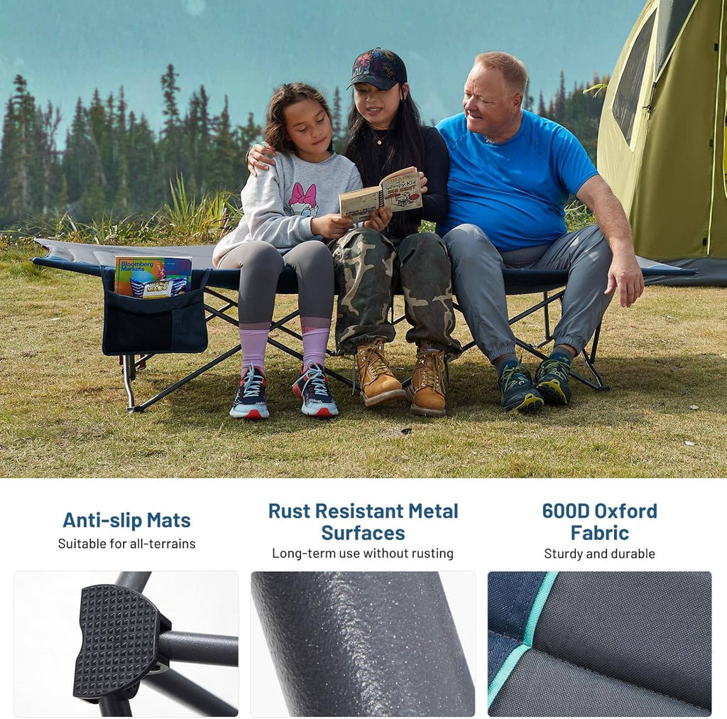 Extra-wide camping cot with gray mattress and blue side rails, suited for outdoor use