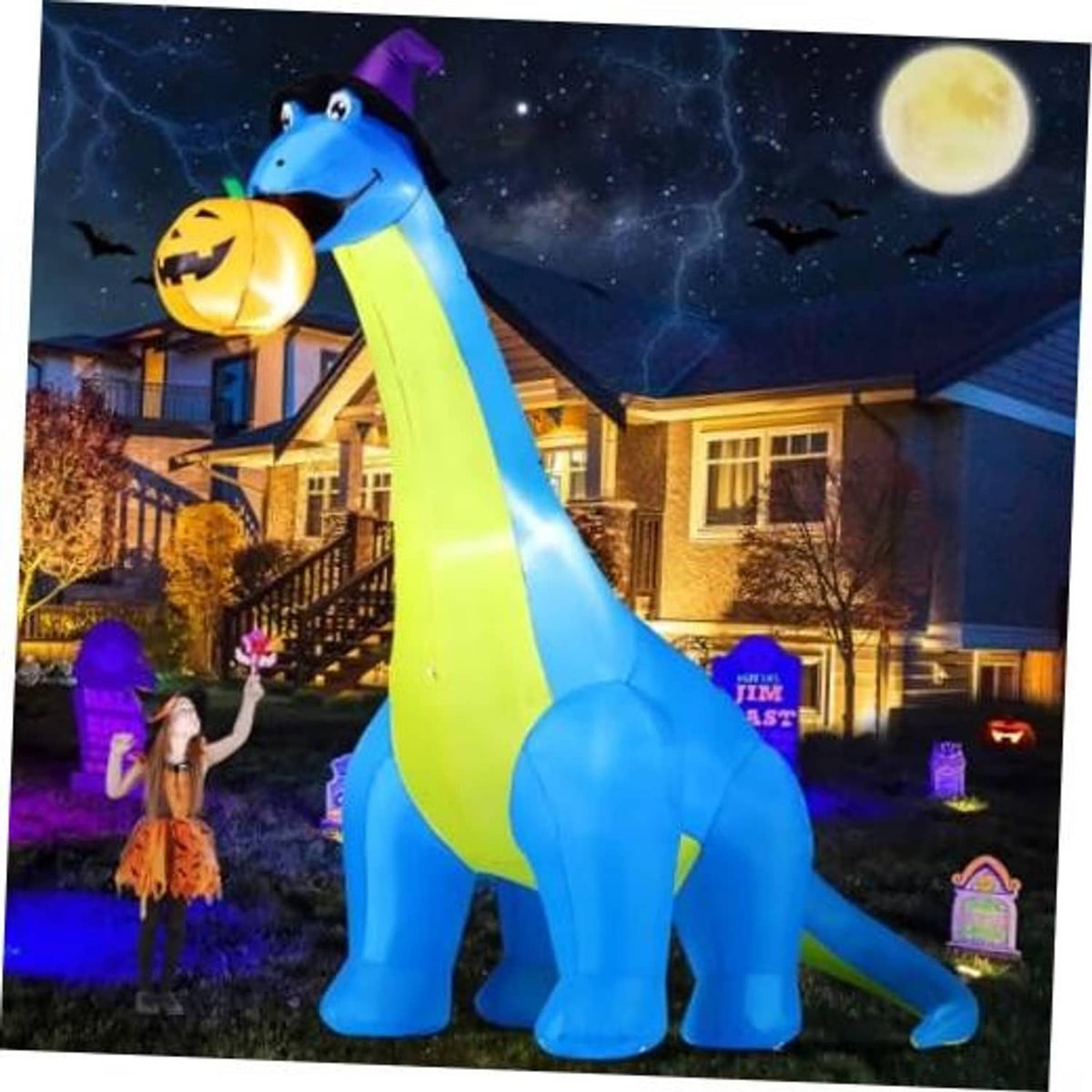 Inflatable blue dinosaur Halloween decoration with green stripe, purple hat, holding pumpkin