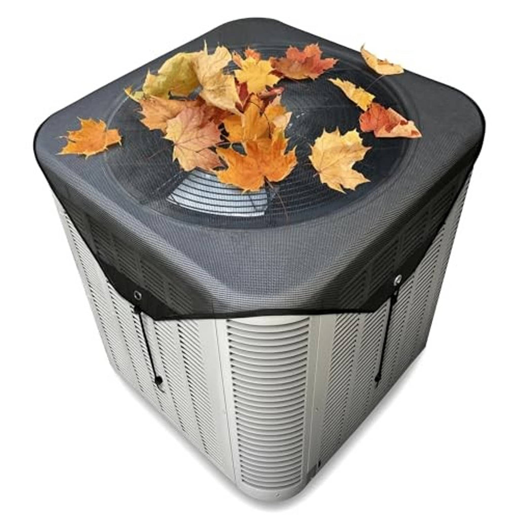 Outdoor AC unit mesh cover with dark fabric top and breathable mesh sides, leaf-covered.