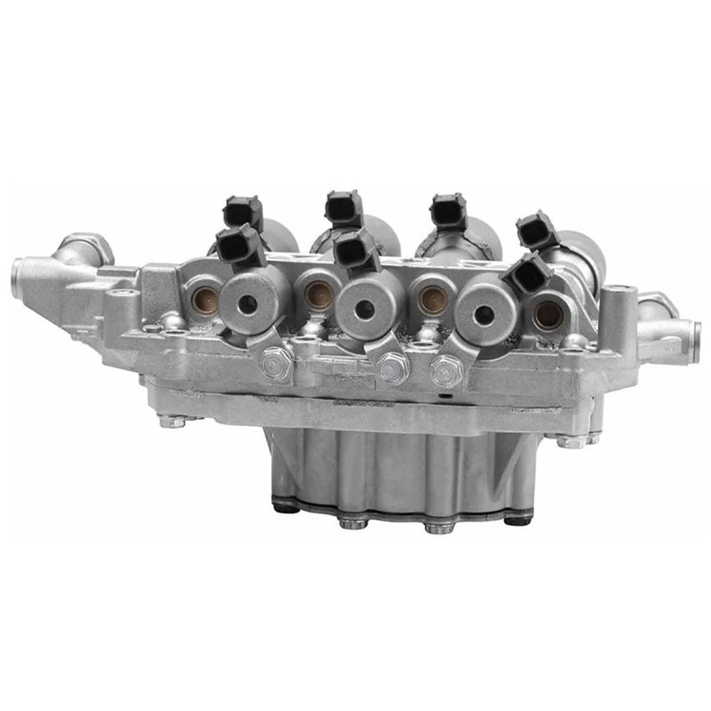 Vehicle valve body assembly side view with black electrical connectors and metal housing