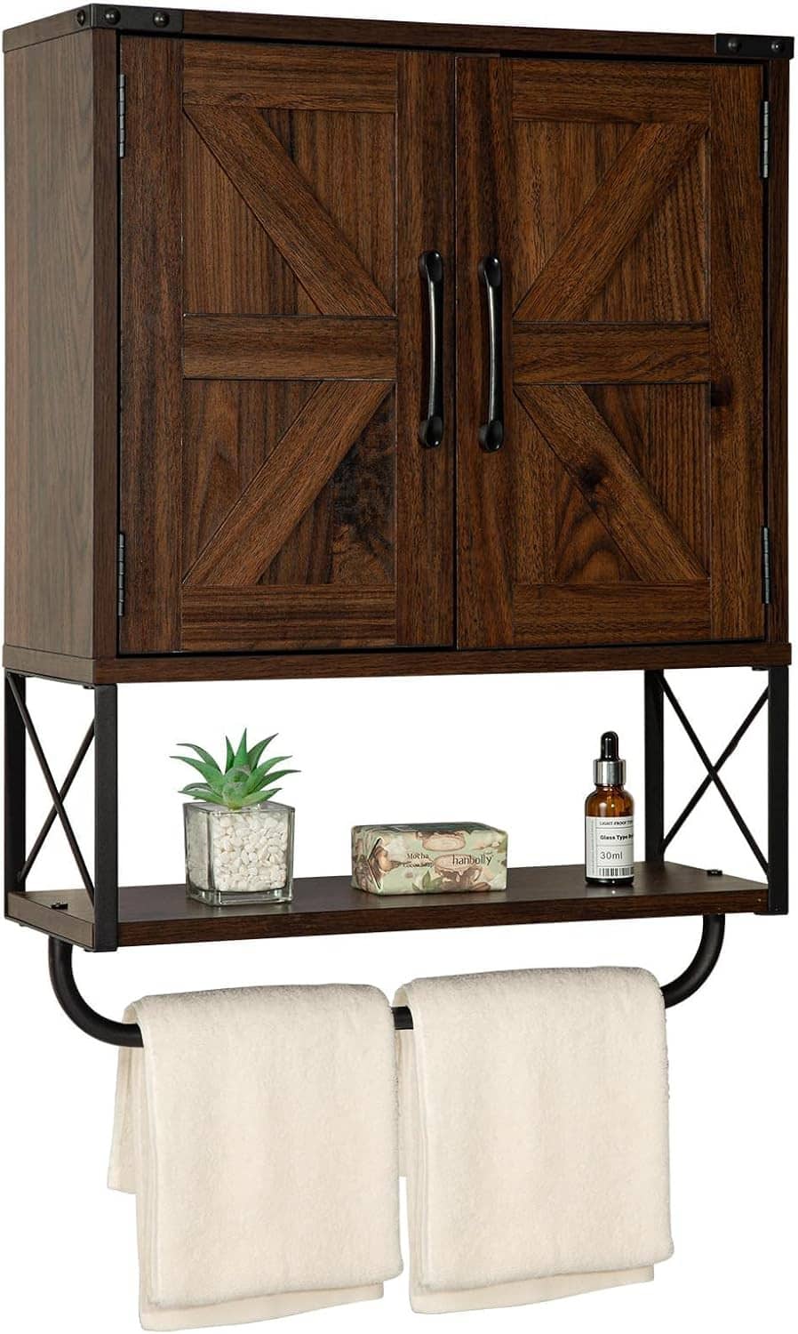 Wall-mounted wooden medicine cabinet with two barn-style doors and black handle, towel bar below