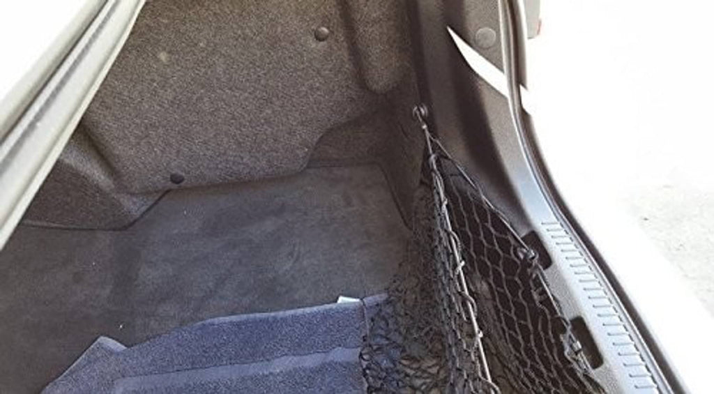 Cargo net hooks holding netting inside the trunk area with chain