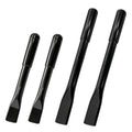 Wheelchair brake handle extenders: two black tapered cylinders with flared end caps