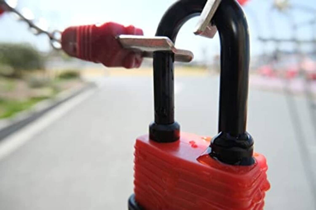 Red waterproof U-buckle padlock with black base and two shackle legs
