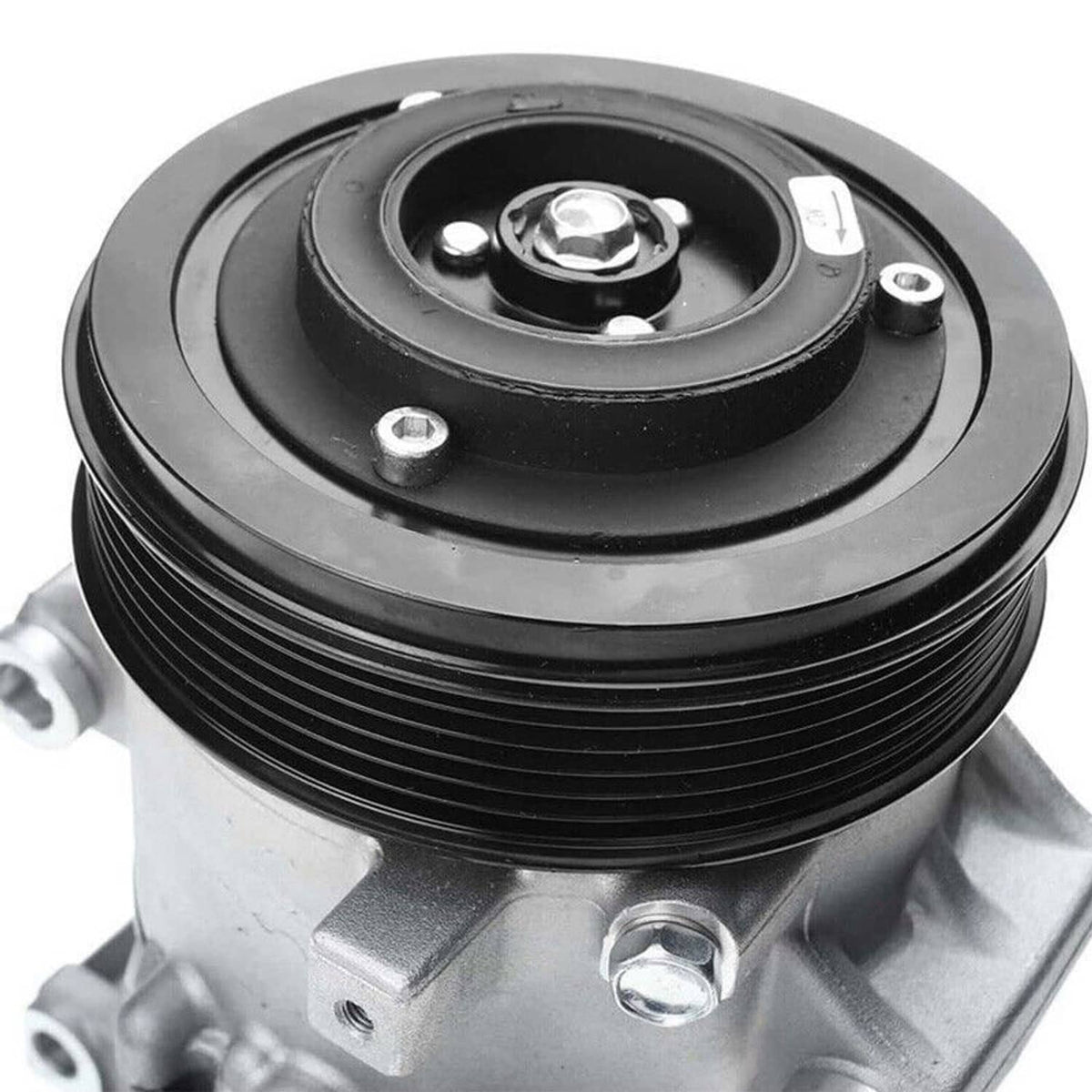 A/C air compressor pulley assembly with black belt groove, close-up