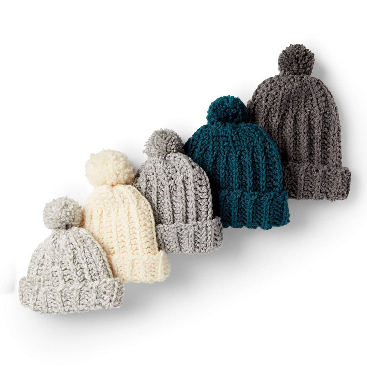 Knit beanie set in cream, light gray, teal, and dark charcoal tones