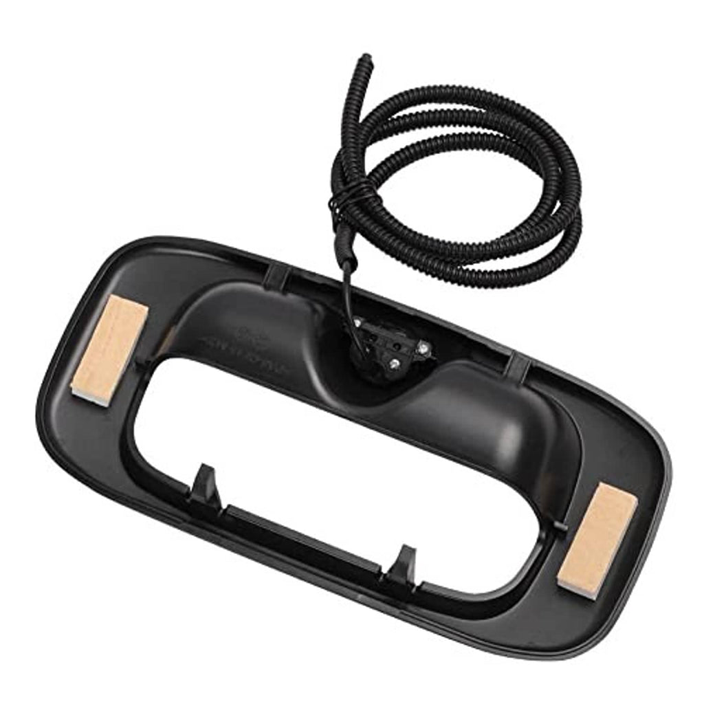Black tailgate camera housing with mounting brackets and wiring harness