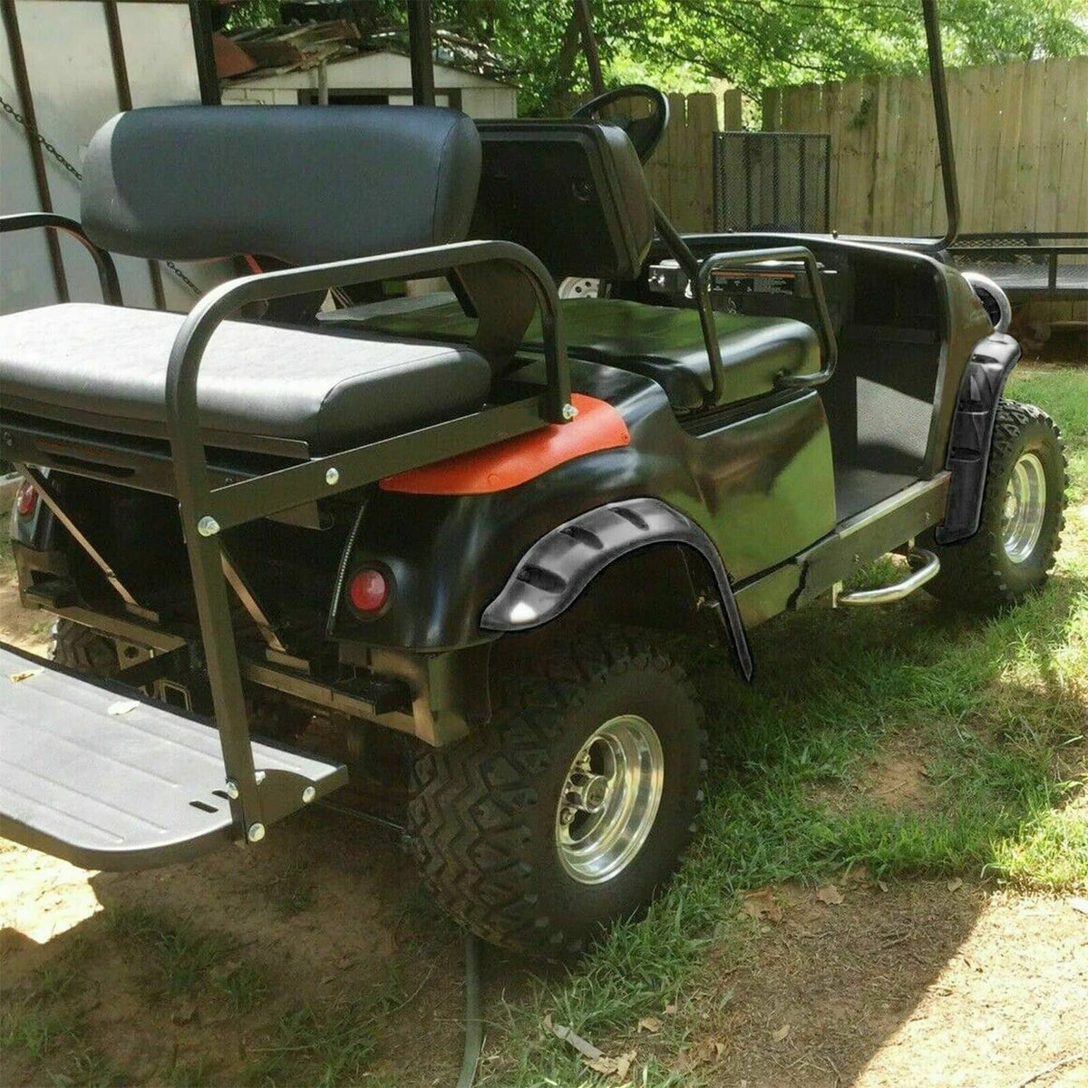 Golf cart fender flares set with hardware brackets, mounted on a golf cart