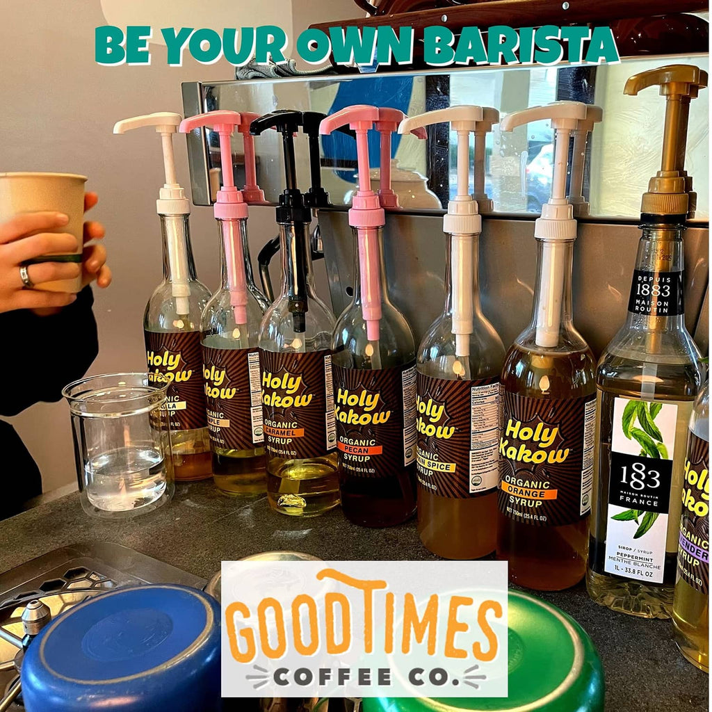 Gold syrup pump dispensers on bottle tops with dip tubes for coffee syrup