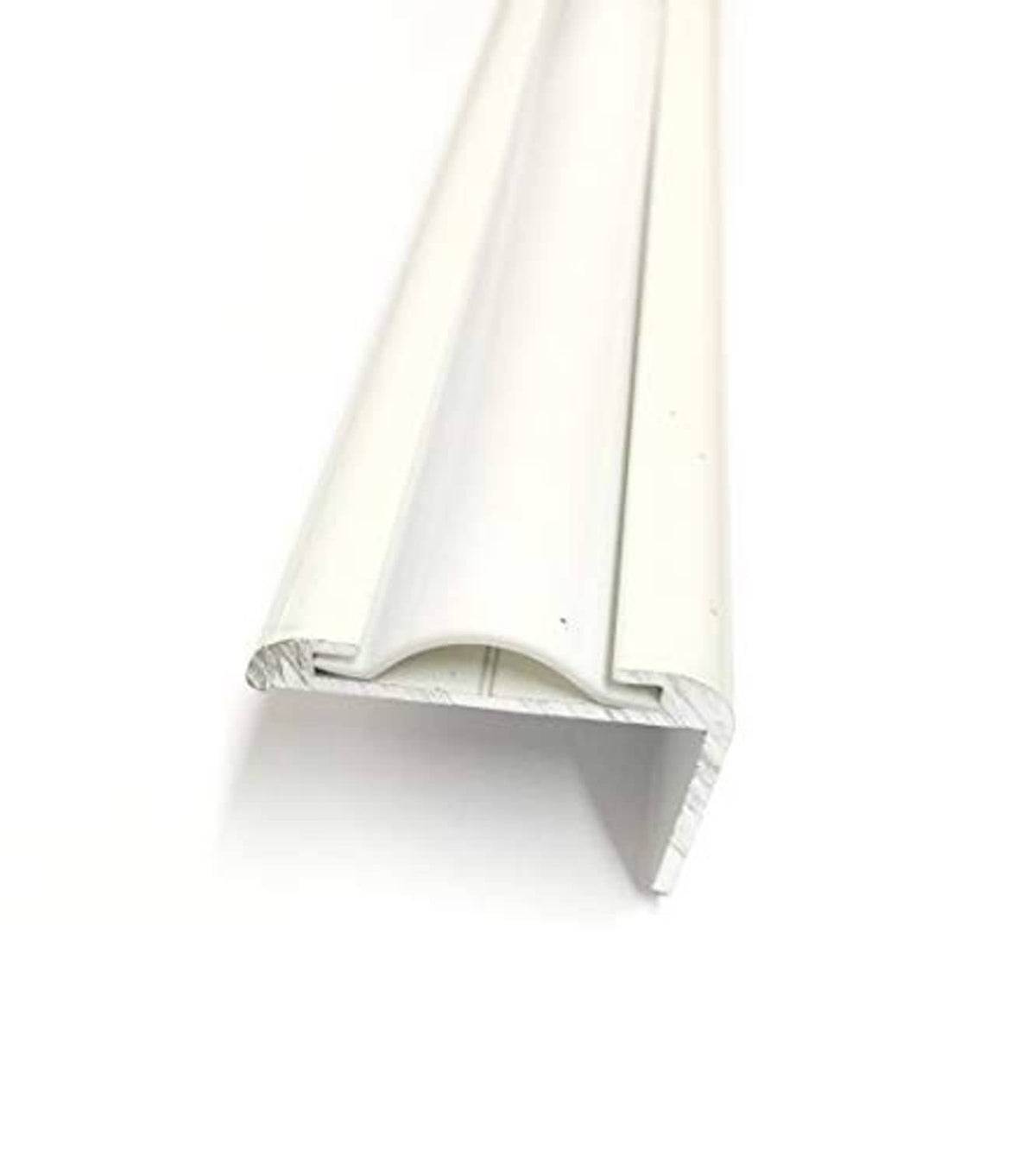 White vinyl insert molding trim piece showing curved underside channel
