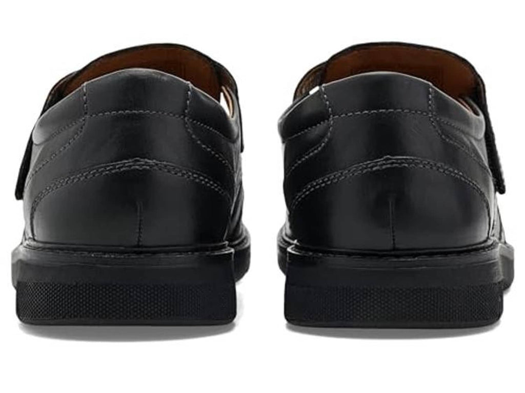 Black leather casual shoes back view with cushioned heel and stitched seams