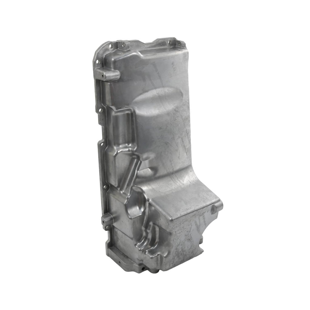 Engine oil pan kit side view of metal housing with internal passage and mounting tabs