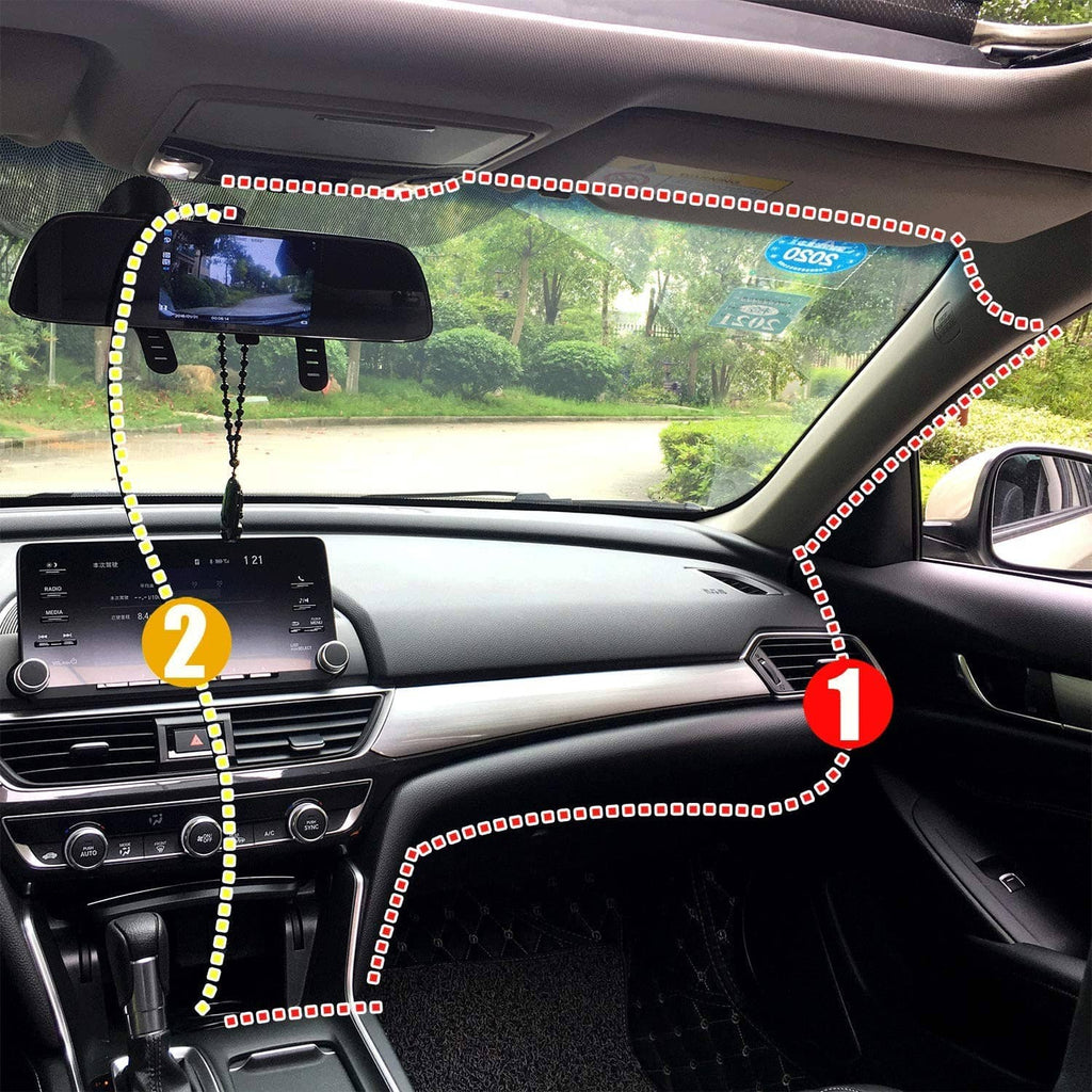 Dash cam charging power cable routed across car dashboard, black cable with connector