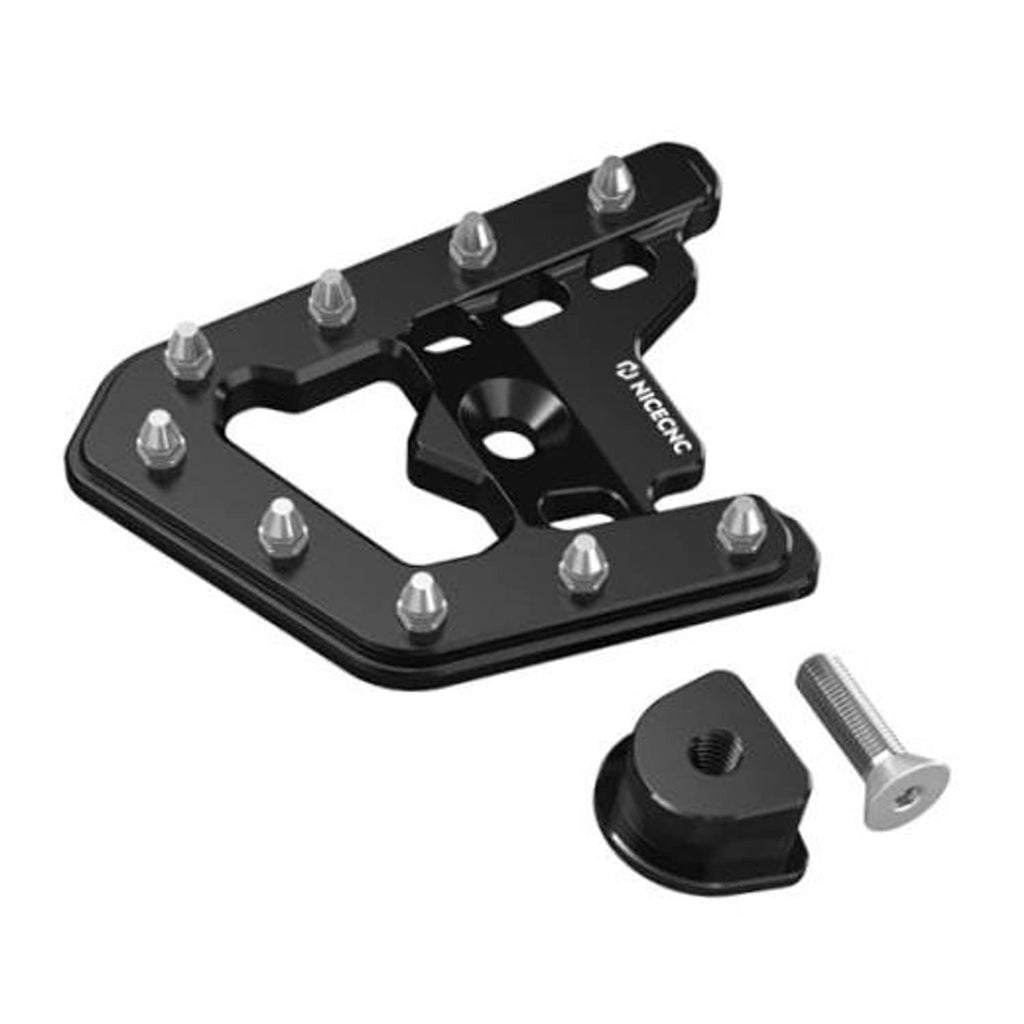 Black brake pedal lever extender plate with multiple bolts and included mounting stud.