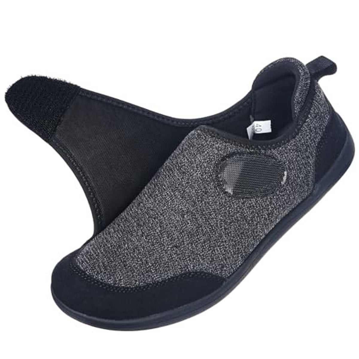 Dark slip-on slipper with textured upper, padded collar, and hook-and-loop strap