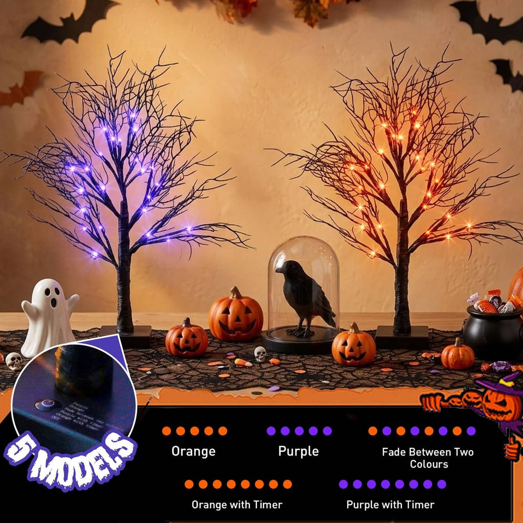 Pair of Halloween LED light trees on table, glowing purple and orange branches