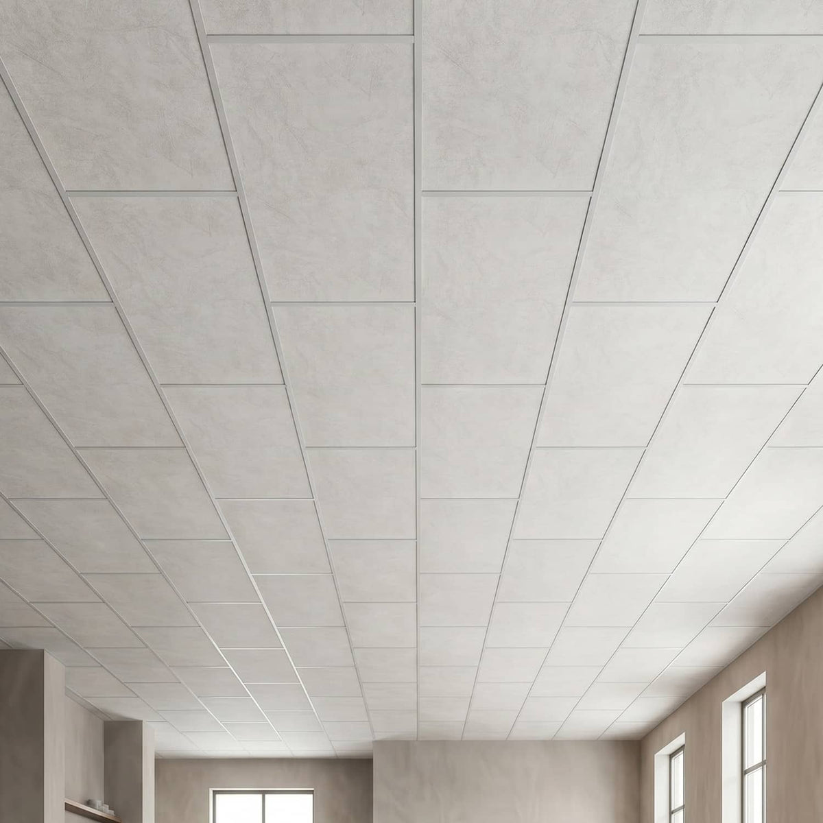 Wide view of white marble ceiling tiles across a suspended ceiling