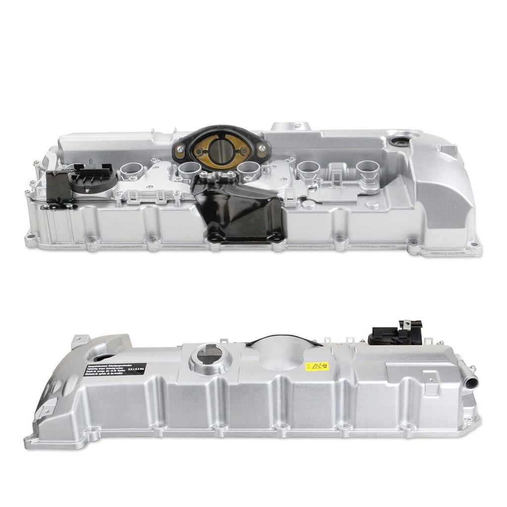 Aluminum engine valve cover shown top and bottom halves, silver with black center housing