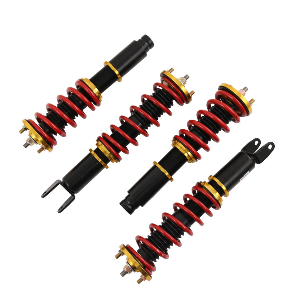 Adjustable coilover struts set: black dampers with red springs and gold spring seats.