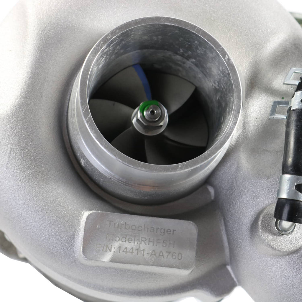 Turbocharger inlet showing impeller and stamped housing markings