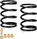 Set of black valve springs with four brass spring retainers, coil spring loops close-up
