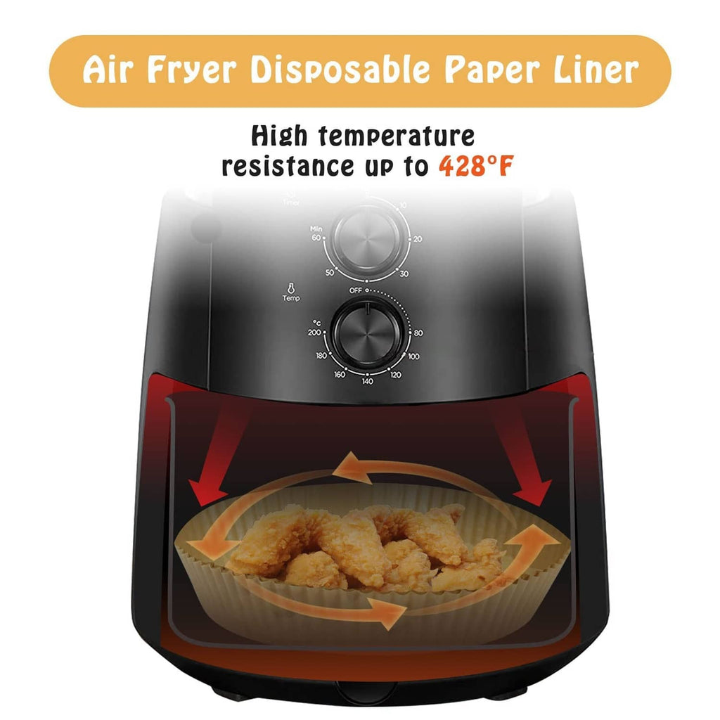 Round air fryer disposable paper liner inside an air fryer basket