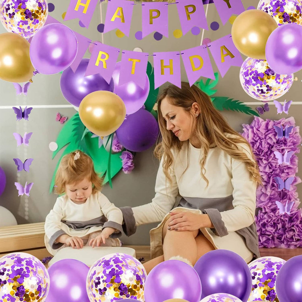 Purple and gold balloons with Happy Birthday banner and butterfly hanging decorations