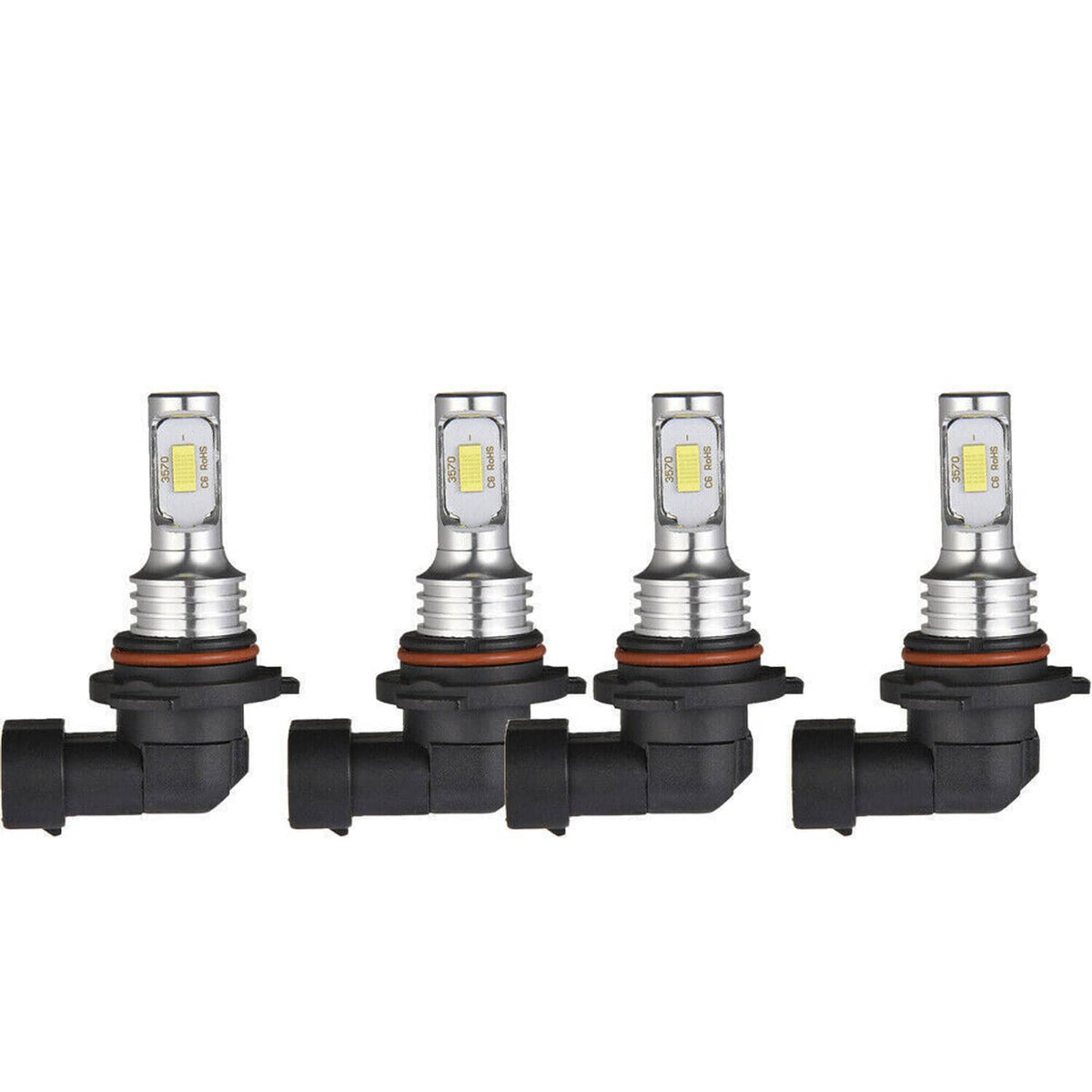 Four LED headlight bulbs with metal heat sinks and black bases, front view