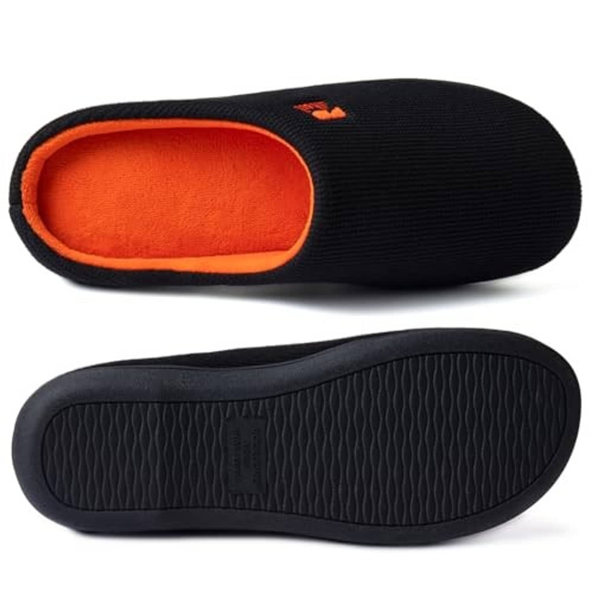 Black knit slippers with orange interior and textured rubber sole for traction
