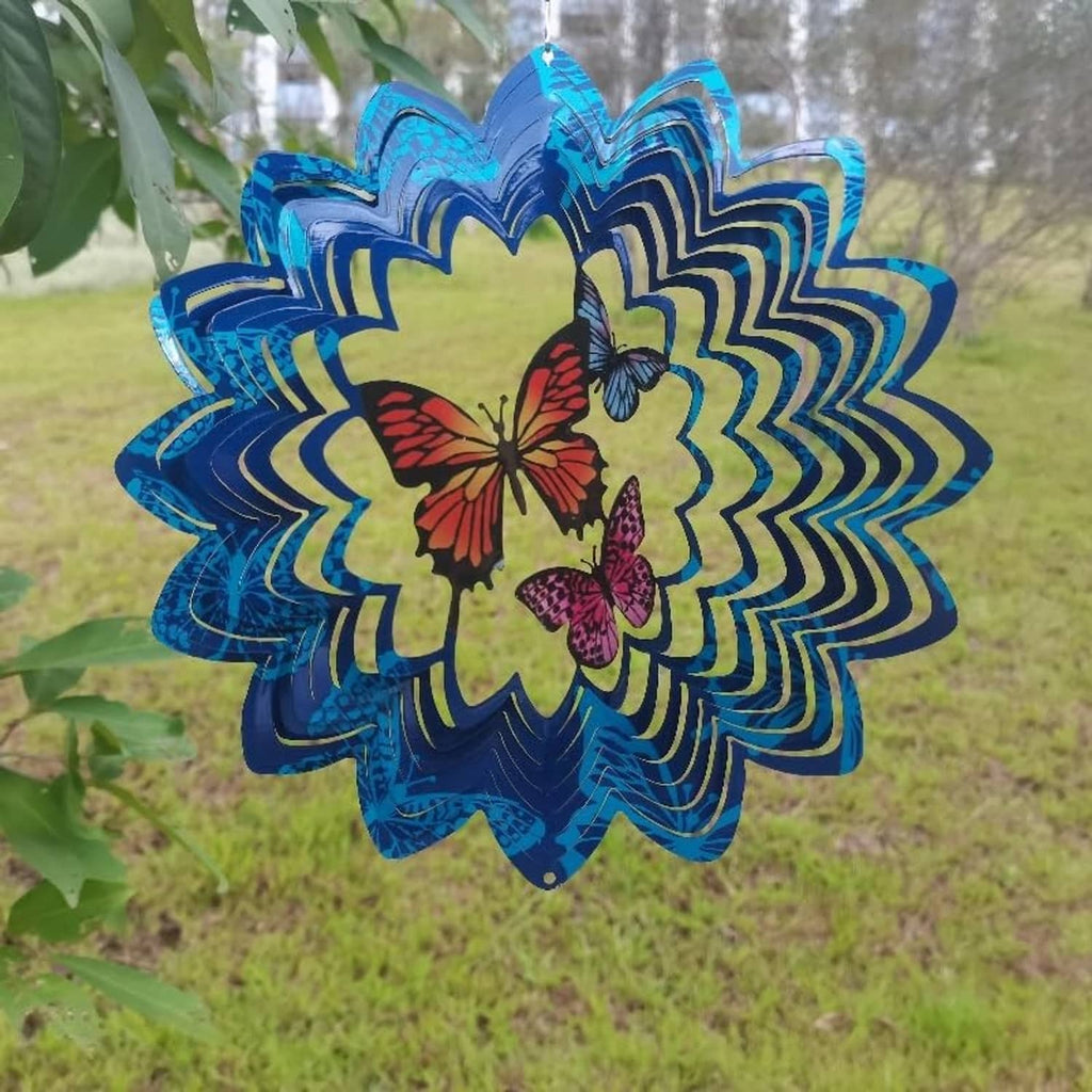 Blue metal butterfly wind spinner with layered swirl petals and hanging chain