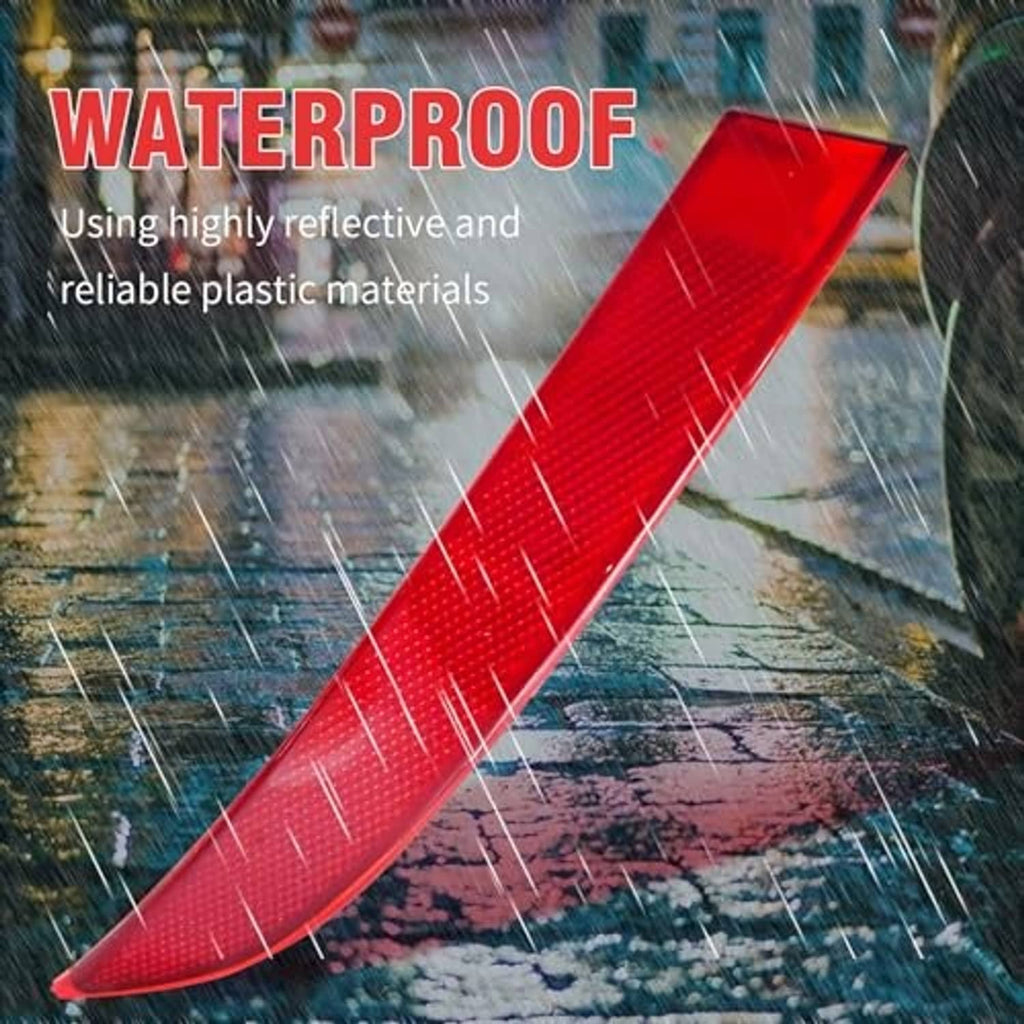Single red rear bumper reflector lens with textured reflective surface